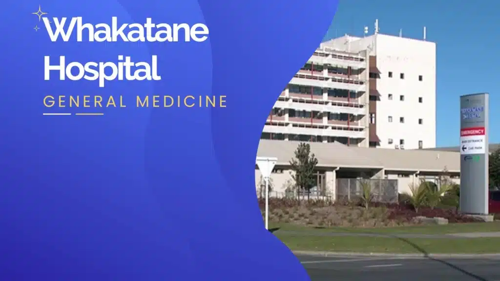 Whakatane Hospital building with directional sign for emergency and main entrance